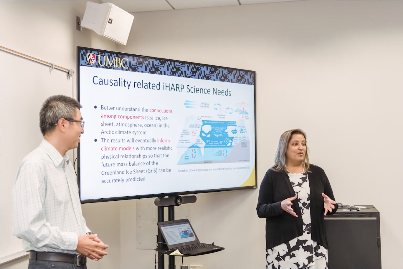 Researcher presenting at conference